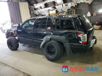Drugie zdjęcie samochodu z przodu: 2001 JEEP GRAND CHEROKEE LAREDO VIN:1J4GW48S51C731382 - miniatura
