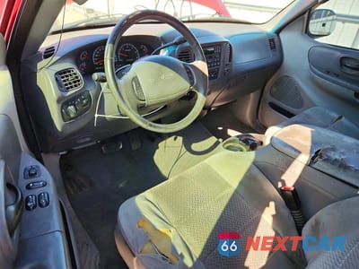 Zdjęcie 8 z 12 samochodu: 2002 FORD F150 VIN:1FTRX18L52NB47637 - miniatura
