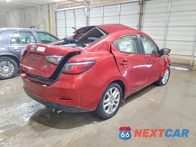Trzecie zdjęcie samochodu z tyłu: 2018 TOYOTA YARIS IA BASE VIN:3MYDLBYV2JY317419 - miniatura