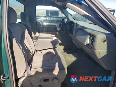Zdjęcie 10 z 12 samochodu: 1999 GMC NEW SIERRA K1500 VIN:1GTEK14T4XZ517799 - miniatura
