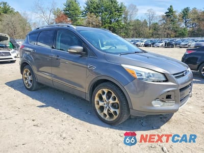 Czwarte zdjęcie samochodu z boku: 2013 FORD ESCAPE TITANIUM VIN:1FMCU9J90DUC18419 - miniatura