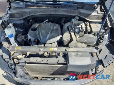 Zdjęcie 12 z 13 samochodu: 2013 HYUNDAI SANTA FE SPORT 2.4L VIN:5XYZUDLB7DG027048 - miniatura
