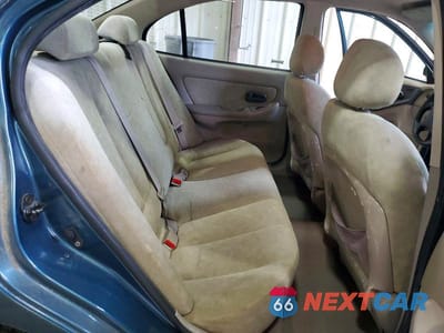 Zdjęcie 10 z 13 samochodu: 2003 HYUNDAI ELANTRA GLS VIN:KMHDN45D33U646664 - miniatura