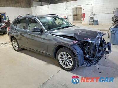 Czwarte zdjęcie samochodu z boku: 2015 BMW X1 XDRIVE28I VIN:WBAVL1C53FVY29826 - miniatura