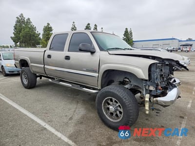 Czwarte zdjęcie samochodu z boku: 2003 GMC SIERRA C2500 HEAVY DUTY VIN:1GTHC23173F155799 - miniatura
