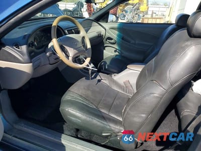 Zdjęcie 7 z 12 samochodu: 1998 FORD MUSTANG VIN:1FAFP4048WF132581 - miniatura