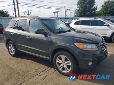 Czwarte zdjęcie samochodu z boku: 2010 HYUNDAI SANTA FE SE VIN:5NMSH4AG0AH355014 - miniatura