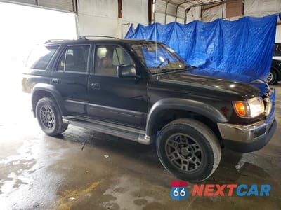 Czwarte zdjęcie samochodu z boku: 1997 TOYOTA 4RUNNER LIMITED VIN:JT3HN87R7V0127590 - miniatura