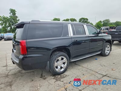Trzecie zdjęcie samochodu z tyłu: 2015 CHEVROLET SUBURBAN K1500 LTZ VIN:1GNSKKKC0FR540613 - miniatura