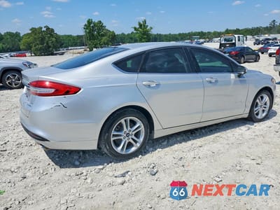 Trzecie zdjęcie samochodu z tyłu: 2018 FORD FUSION SE HYBRID VIN:3FA6P0LU5JR248160 - miniatura