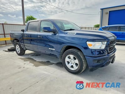 Czwarte zdjęcie samochodu z boku: 2024 RAM 1500 BIG HORN VIN:1C6RREFTXRN113019 - miniatura