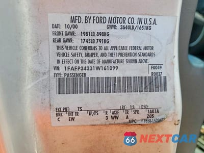 Zdjęcie 12 z 12 samochodu: 2001 FORD FOCUS SE VIN:1FAFP34331W161099 - miniatura