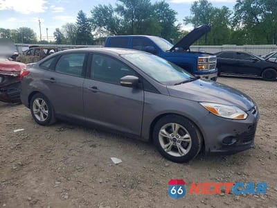 Czwarte zdjęcie samochodu z boku: 2014 FORD FOCUS SE VIN:1FADP3F27EL340295 - miniatura