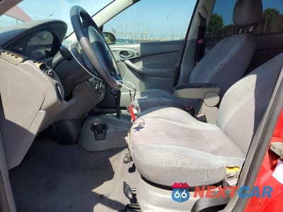 Zdjęcie 7 z 12 samochodu: 2003 FORD FOCUS ZX5 VIN:3FAFP37Z13R191398 - miniatura