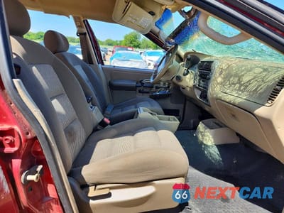 Zdjęcie 7 z 14 samochodu: 2003 FORD EXPLORER SPORT TRAC VIN:1FMZU67E83UB98514 - miniatura