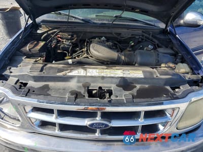 Zdjęcie 11 z 12 samochodu: 1998 FORD F150 VIN:1FTZF1767WNA89924 - miniatura