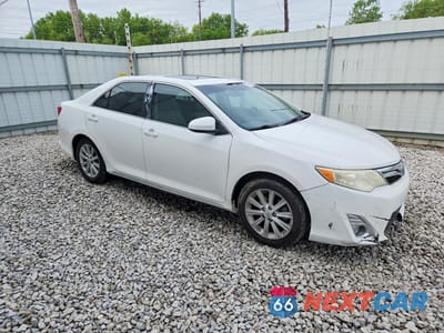 Czwarte zdjęcie samochodu z boku: 2012 TOYOTA CAMRY XLE V6 VIN:4T1BK1FK6CU505129 - miniatura
