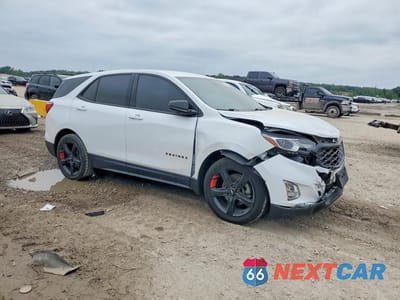 Czwarte zdjęcie samochodu z boku: 2018 CHEVROLET EQUINOX LT VIN:2GNAXKEX5J6270262 - miniatura