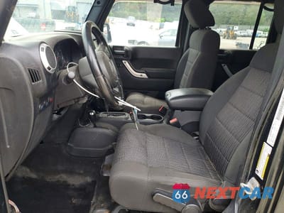 Zdjęcie 7 z 13 samochodu: 2011 JEEP WRANGLER UNLIMITED SAHARA VIN:1J4BA5H15BL532579 - miniatura