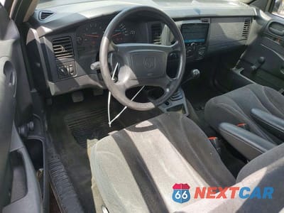 Zdjęcie 8 z 12 samochodu: 2004 DODGE DAKOTA SXT VIN:1D7FL16K94S593339 - miniatura
