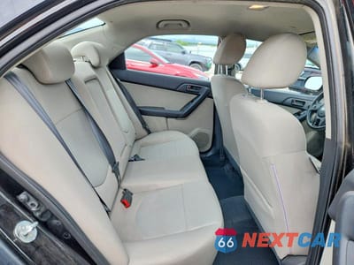 Zdjęcie 10 z 13 samochodu: 2010 KIA FORTE EX VIN:KNAFU4A2XA5063954 - miniatura