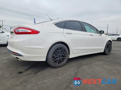 Trzecie zdjęcie samochodu z tyłu: 2013 FORD FUSION SE VIN:3FA6P0HR0DR192959 - miniatura