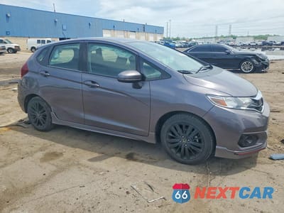 Czwarte zdjęcie samochodu z boku: 2019 HONDA FIT SPORT VIN:3HGGK5H6XKM713391 - miniatura