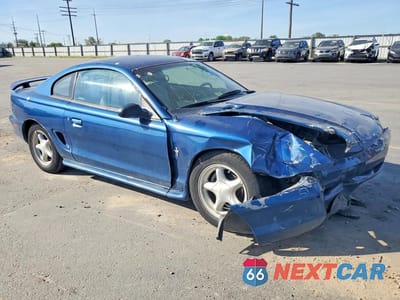 Czwarte zdjęcie samochodu z boku: 1998 FORD MUSTANG VIN:1FAFP4041WF160075 - miniatura
