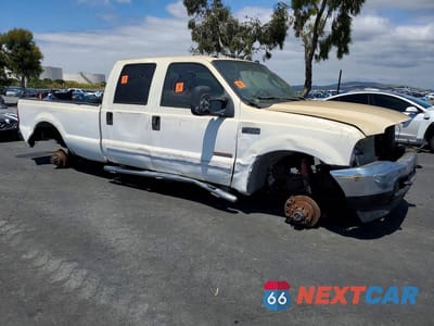 Czwarte zdjęcie samochodu z boku: 2003 FORD F350 SRW SUPER DUTY VIN:1FTSW31P13EB47424 - miniatura