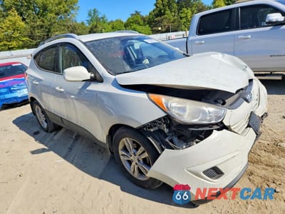 Czwarte zdjęcie samochodu z boku: 2011 HYUNDAI TUCSON GLS VIN:KM8JU3AC9BU287168 - miniatura