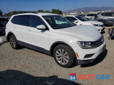 Czwarte zdjęcie samochodu z boku: 2019 VOLKSWAGEN TIGUAN S VIN:3VV1B7AX4KM039324 - miniatura