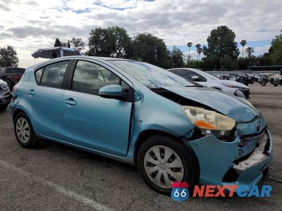 Czwarte zdjęcie samochodu z boku: 2012 TOYOTA PRIUS C TWO VIN:JTDKDTB32C1029844 - miniatura