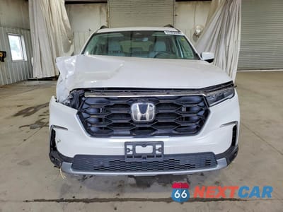 Piąte zdjęcie samochodu w środku: 2025 HONDA PILOT TOURING VIN:5FNYG1H77SB022331 - miniatura