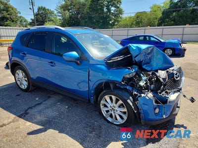 Czwarte zdjęcie samochodu z boku: 2014 MAZDA CX-5 GT VIN:JM3KE4DYXE0351577 - miniatura