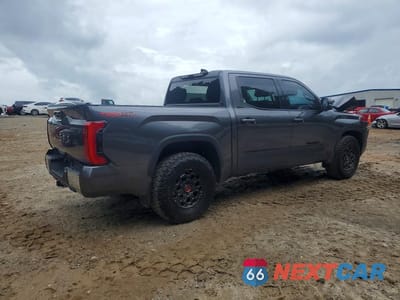 Trzecie zdjęcie samochodu z tyłu: 2022 TOYOTA TUNDRA SR5 VIN:5TFLA5AB3NX012584 - miniatura