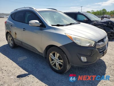 Czwarte zdjęcie samochodu z boku: 2013 HYUNDAI TUCSON GLS VIN:KM8JUCAC6DU568539 - miniatura