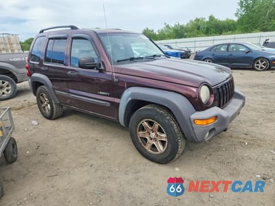 Czwarte zdjęcie samochodu z boku: 2004 JEEP LIBERTY SPORT VIN:1J8GL48K14W286939 - miniatura