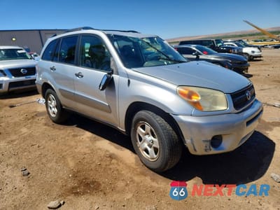 Czwarte zdjęcie samochodu z boku: 2004 TOYOTA RAV4 BASE VIN:JTEGD20V540044751 - miniatura