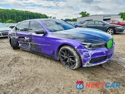 Czwarte zdjęcie samochodu z boku: 2019 BMW 750 XI VIN:WBA7F2C55KB239760 - miniatura