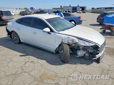 Czwarte zdjęcie samochodu z boku: 2021 HYUNDAI SONATA HYBRID BLUE VIN:KMHL24JJ5MA018284 - miniatura
