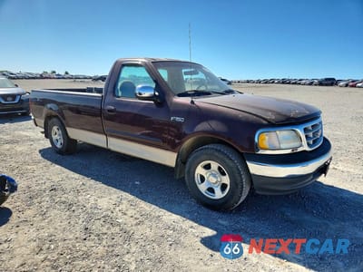 Czwarte zdjęcie samochodu z boku: 2000 FORD F150 VIN:1FTZF1721YNA94617 - miniatura