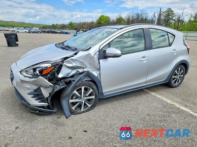 2018 TOYOTA PRIUS C ONE JTDKDTB35J1610431 - główne zdjęcie licytacji z USA - miniatura