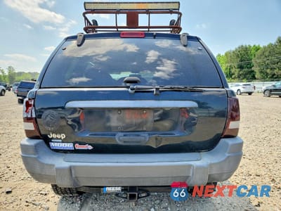 Zdjęcie 6 z 13 samochodu: 2001 JEEP GRAND CHEROKEE LAREDO VIN:1J4GW48S51C607774 - miniatura