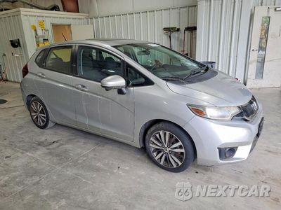 Czwarte zdjęcie samochodu z boku: 2016 HONDA FIT EX VIN:JHMGK5H74GX029041 - miniatura