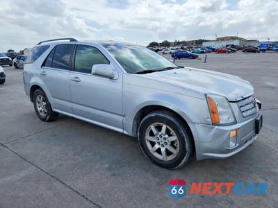 Czwarte zdjęcie samochodu z boku: 2009 CADILLAC SRX VIN:1GYEE437090154965 - miniatura