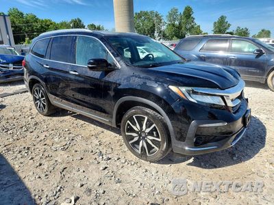Czwarte zdjęcie samochodu z boku: 2019 HONDA PILOT TOURING VIN:5FNYF6H97KB047604 - miniatura