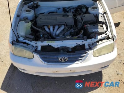 Zdjęcie 11 z 12 samochodu: 2001 TOYOTA COROLLA LE VIN:1NXBR12E41Z563734 - miniatura