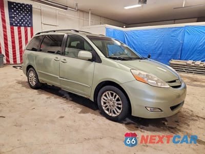 Czwarte zdjęcie samochodu z boku: 2007 TOYOTA SIENNA XLE 7-PASSENGER VIN:5TDZK22C97S076585 - miniatura