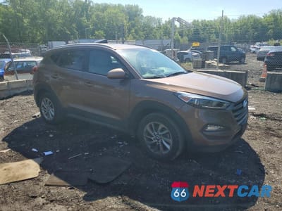 Czwarte zdjęcie samochodu z boku: 2016 HYUNDAI TUCSON SE VIN:KM8J33A46GU186785 - miniatura