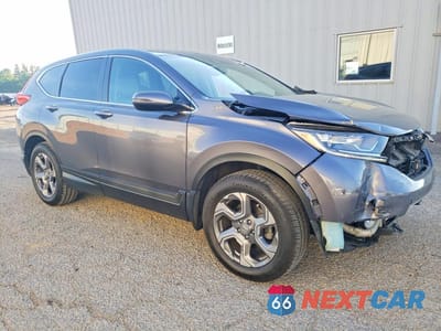 Czwarte zdjęcie samochodu z boku: 2017 HONDA CR-V EXL VIN:2HKRW2H82HH686181 - miniatura